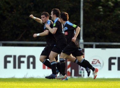 Graham Rusk celebrates UCD's winner with team-mates.