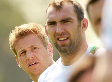 Chris Henry and John Muldoon listen intently