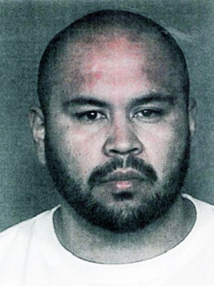 Emmanuel Delarosa, 27, a high school teacher who was arrested on suspicion of directing students to assault at least one other student