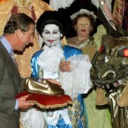 Unless they are dipped in gold, as this pair appear to be, avoid the pair of slippers trap which might infer that you think he's getting on... Pic: PA Wire/Reuters Rota Pic.