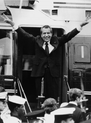 Richard Nixon's victorious salute to White House staff members on the day he resigned as US President following the Watergate scandal.