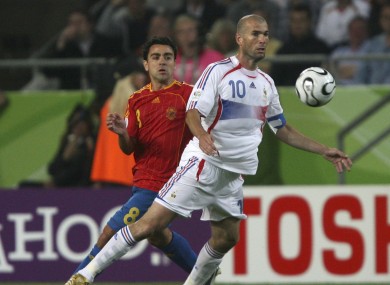 Zidane with Xavi on his back.