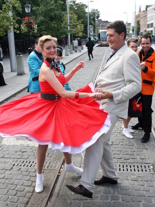 Former communications minister Eamon Ryan joins Nicola Hanlon, a 1950s dancehall hopper, during celebrations marking the 50th Anniversary of Prize Bonds in 2007.