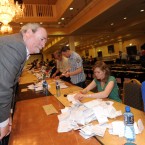  Labour TD Eric Byrne tallies as counting begins at the Dublin City count centre in CityWest. (Laura Hutton/Photocall Ireland)