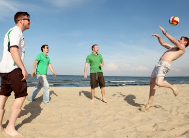 Irish fans enjoy the Baltic conditions.