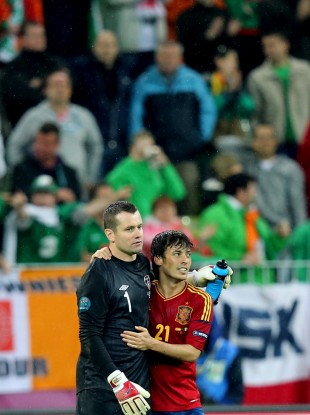 Shay given and David Silva embrace after the final whistle.