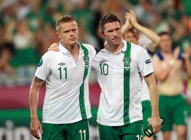 Brothers in arms: Damien Duff and Robbie Keane trudge off at the end of the game.