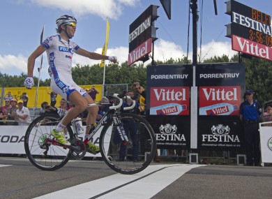 Thibaut Pinot of France crosses the finish line to win the 8th stage of the Tour de France yesterday.