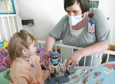 Cystic fibrosis patient Malea Gardner with Child Life Specialist Catherine Coakley