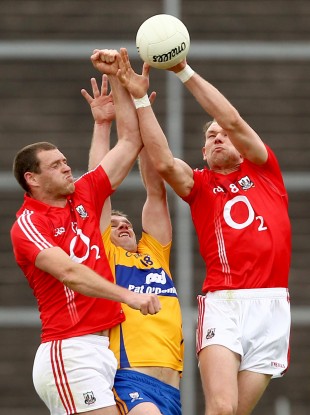 Cork and Clare players battle for possession during last year's championship tie.