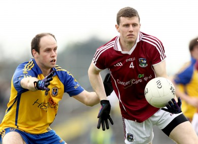 Keith Kelly (right) moves to corner back for Galway.