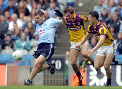 Dublin's Kevin McManamon with Brian Malone and Lee Chin of Wexford.