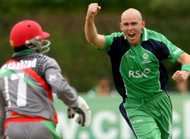 Trent Johnston celebrates the wicket of Mohammad Shahzad.