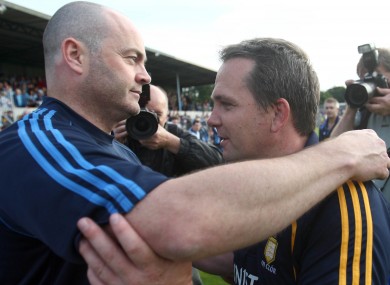 Anthony Daly and Davy Fitzgerald embrace after Saturday's game.