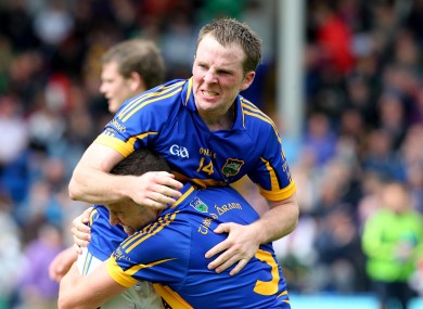 Tipperary's Peter Acheson is lifted by teammate Paddy Codd as they celebrate last week's qualifier win over Wexford.
