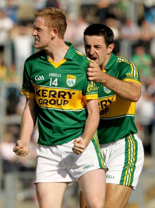 Kerry's Colm Cooper and Aidan O'Mahony celebrate a point during yesterday's game.