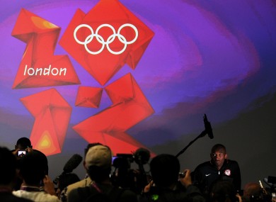 Kobe Bryant gets cosy with the media in London.