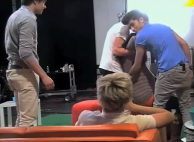 Niall supervises from the sofa