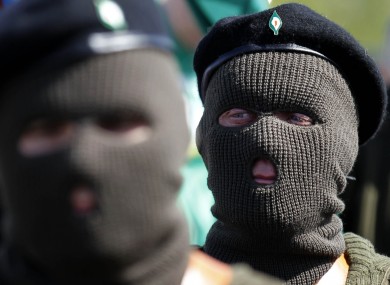 Members of the Real IRA attend an Easter Rising anniversary event last year. The Real IRA is one of three groups which have merged to reclaim the title of the 'Irish Republican Army'.