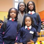 Sarah Wuddah pictured with her three daughters, Ajoa (7), Aba (4) and Essie (9) on Aba's first day of big school. Photo: Laura Hutton/Photocall Ireland