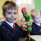 Alexandru Pascaru shows off his first school project. Photo: Laura Hutton/Photocall Ireland
