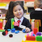 It's all no bother to An Nguyen as she enjoys playing with blocks on her first day. Photo: Laura Hutton/Photocall Ireland