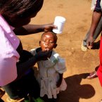 Providing a child with medication to prevent ringworm