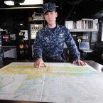 Lt JG Christopher Mikell of the US Navy points to a map of Dublin Port which the USS Fort McHenry used to docked at Dublin Port last night. (Photo: Laura Hutton/Photocall Ireland)