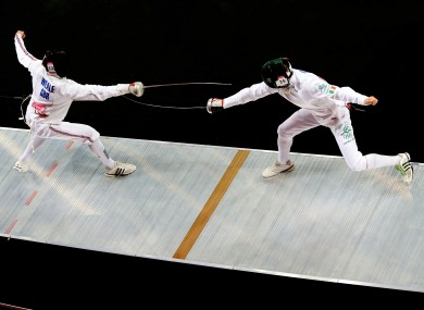 Ireland's Arthur Lanigan O'Keeffe, right, on the piste during the modern pentathlon.