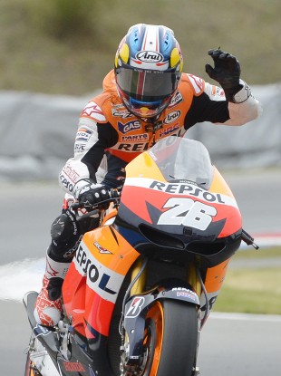 Honda rider Dani Pedrosa of Spain celebrates after winning the MotoGP at the Grand Prix of Czech Republic.