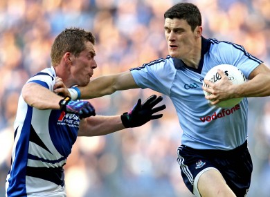 Arm's length: Diarmuid Connolly holds off Darren Strong as his side just held off Laois