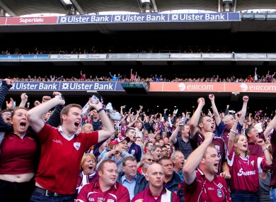Galway fans celebrate late in the game yesterday.