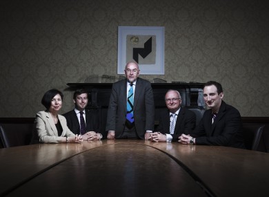 Ruairí Quinn with some of his advisers at the Department of Education.