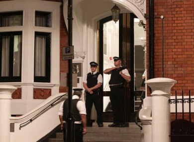 Police officers outside the Ecuadorian Embassy in central London last night.
