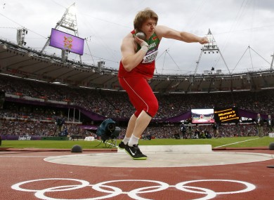 Belarus' Nadzeya Ostapchuk takes a throw in the women's shot put final