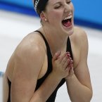 United States' Missy Franklin celebrates after  the women's 4 x 100-meter medley relay final at the Aquatics Centre in the Olympic Park during the 2012 Summer Olympics, London, Saturday, Aug. 4, 2012. (AP Photo/Jae C. Hong)