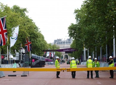 Workmen on the closed off Mall, as last minute preparations are made for the Paralympics.