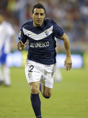 Cazorla playing for Malaga.