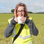 Car parking steward Alice McAlpine enjoys a cup of tea, made for her by one of the recently parked festival attendees, in car park c on the second day of the Electric Picnic music and arts festival in Stradbally Co Laois. Photo: Laura Hutton/Photocall Ireland