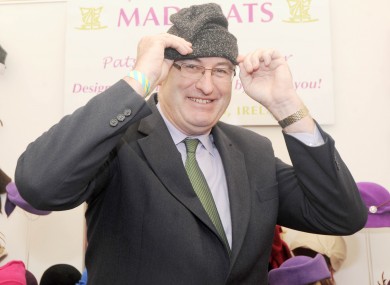 Phil Hogan tries on a hat at the Ploughing Championships in Wexford today.