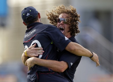 Defending champs: England's Ryan Sidebottom hugs teammate Tim Bresnan during the 2010 World T20.