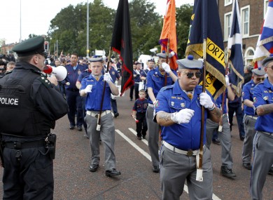 Members of the Royal Black Institution defied a Parades Commission recommendation not to play music outside a Catholic church along its parade route.