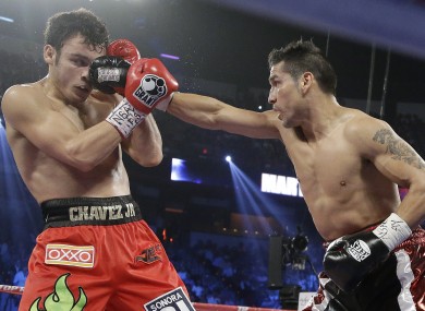Martinez lands a punch against Chavez Jr last night.