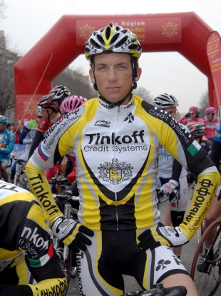 Tyler Hamilton, rests before the start of the second stage of Etoile de Besseges race between Nimes and Saint-Ambroix in 2007.
