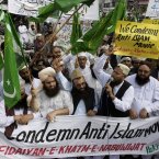 Supporters of a Pakistani religious group Fidaiyan-e-Khatim-e-Nabuwwat hold a demonstration in Karachi, Pakistan as part of widespread anger across the Muslim world about a film ridiculing Islam's Prophet Muhammad. (AP Photo/Fareed Khan)