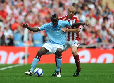 Stoke City's Andy Wilkinson (right) and Manchester City's Mario Balotelli battle for the ball. File picture.