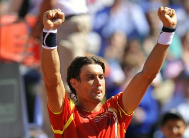 Spain's David Ferrer celebrates after beating Sam Querrey of the US.