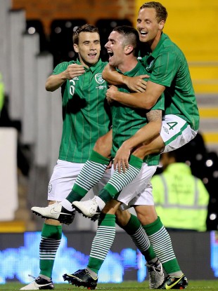 Ireland's Robbie Brady celebrates scoring a goal.