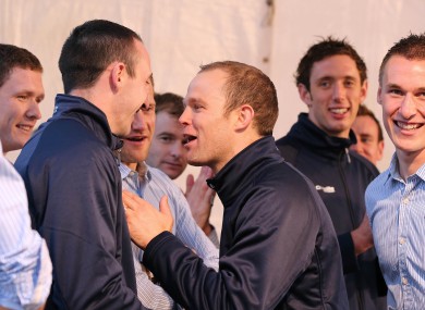 Tommy Walsh (centre), from Phil Hogan's parish of Tullaroan, shares a joke with team captain Eoin Larkin during last night's homecoming at Nowlan Park.