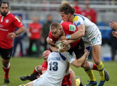 File photo: Vosloo (right) tackles Tom Court in the Heineken Cup meeting with Ulster in January.
